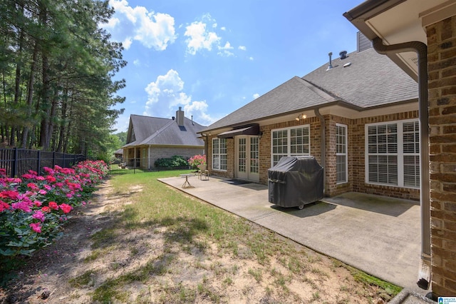 124 Blackstone Ct, Chelsea, AL 35043 - view of yard featuring fence, a patio, and french doors