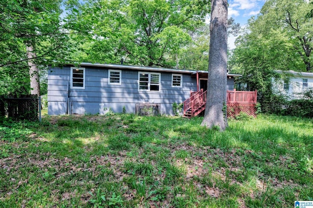 rear view of house with a deck