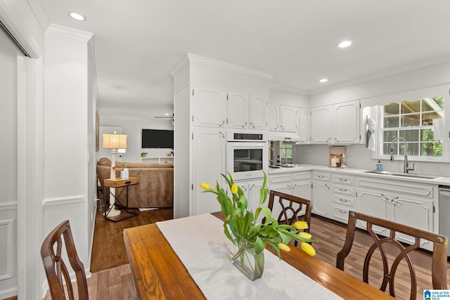 1700 Kestwick Dr, Hoover, AL 35226 - kitchen with light countertops, dark wood finished floors, white cabinets, and white oven