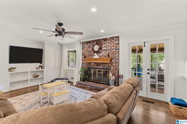 1700 Kestwick Dr, Hoover, AL 35226 - living room with crown molding, visible vents, wood finished floors, ceiling fan, and recessed lighting