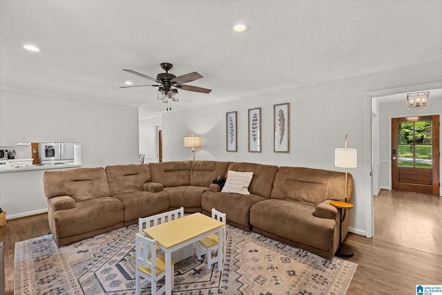 1700 Kestwick Dr, Hoover, AL 35226 - living room featuring a ceiling fan, recessed lighting, ornamental molding, and wood finished floors