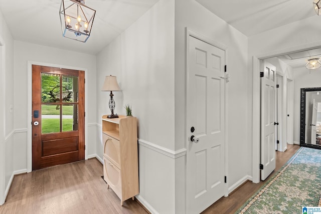 1700 Kestwick Dr, Hoover, AL 35226 - foyer entrance with an inviting chandelier, baseboards, and wood finished floors