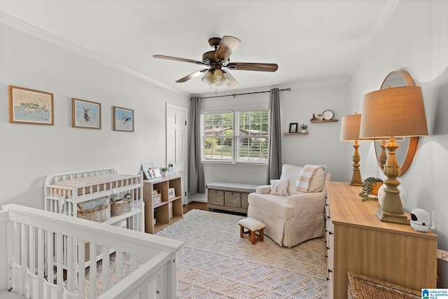 1700 Kestwick Dr, Hoover, AL 35226 - bedroom featuring ornamental molding, a ceiling fan, and a nursery area