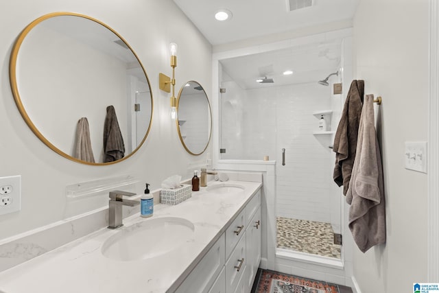 1700 Kestwick Dr, Hoover, AL 35226 - bathroom with double vanity, a sink, a stall shower, and tile patterned flooring