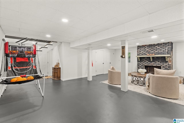 1700 Kestwick Dr, Hoover, AL 35226 - interior space with concrete flooring, a brick fireplace, recessed lighting, baseboards, and visible vents