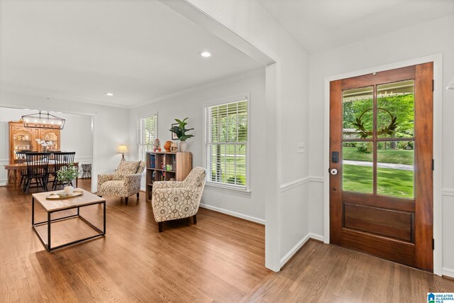 1700 Kestwick Dr, Hoover, AL 35226 - entrance foyer with crown molding, wood finished floors, baseboards, a notable chandelier, and recessed lighting