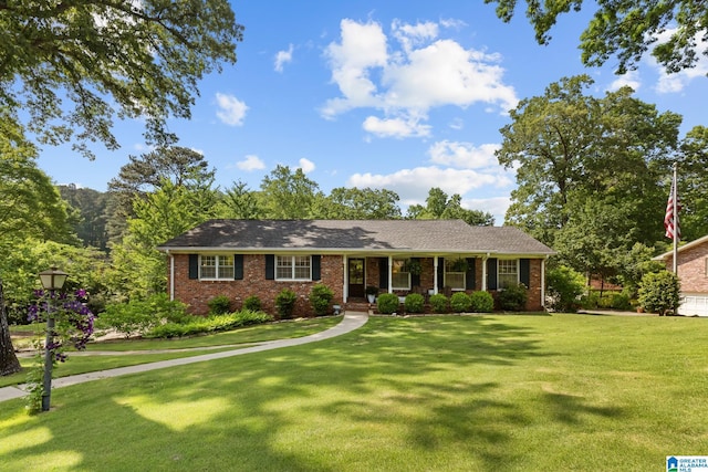 1700 Kestwick Dr, Hoover, AL 35226 - single story home with covered porch, brick siding, and a front yard