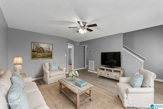 906 Ridgewood Dr, Remlap, AL 35133 - living room with baseboards, a ceiling fan, wood finished floors, and visible vents