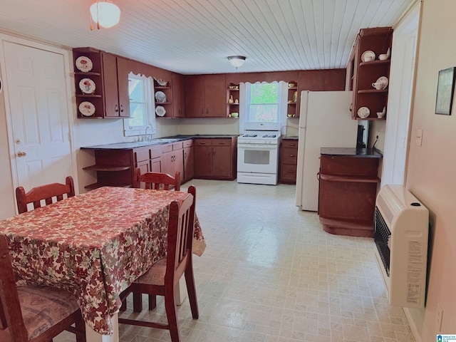 103 Thatcher St, Piedmont, AL 36272 - kitchen with wood ceiling, dark countertops, open shelves, heating unit, and white appliances