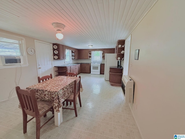 103 Thatcher St, Piedmont, AL 36272 - dining space featuring baseboards, heating unit, wood ceiling, and cooling unit