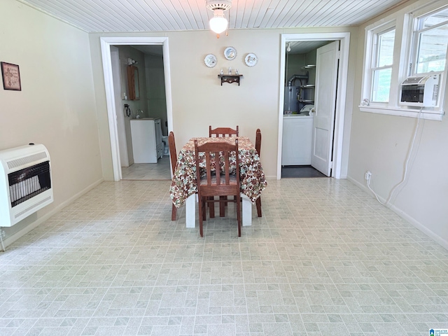 103 Thatcher St, Piedmont, AL 36272 - dining room featuring wood ceiling, washer / clothes dryer, baseboards, cooling unit, and heating unit