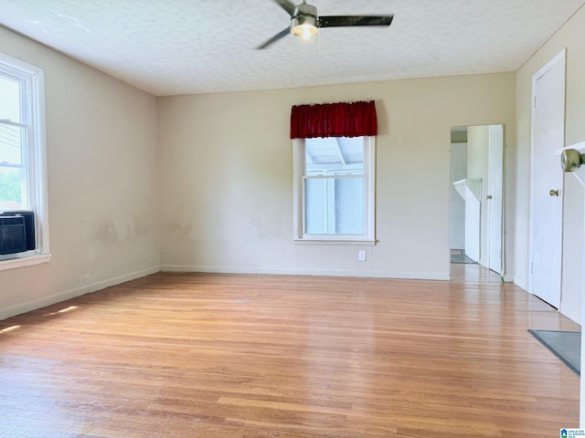 103 Thatcher St, Piedmont, AL 36272 - unfurnished room featuring baseboards, a textured ceiling, light wood finished floors, and ceiling fan