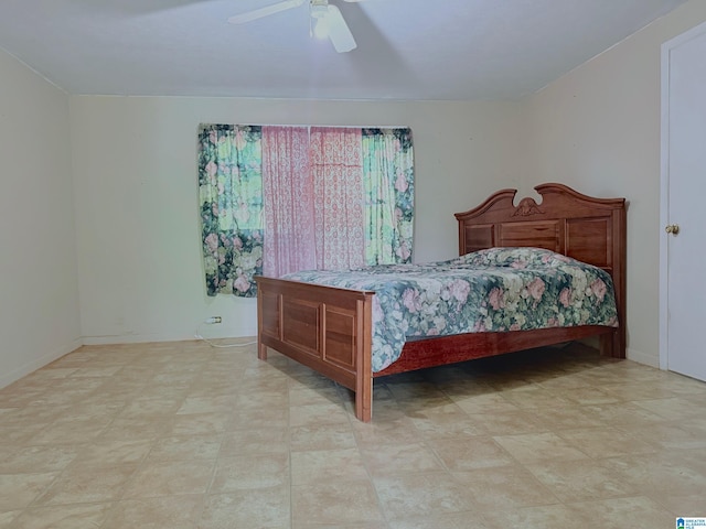 103 Thatcher St, Piedmont, AL 36272 - bedroom with a ceiling fan, baseboards, and light floors