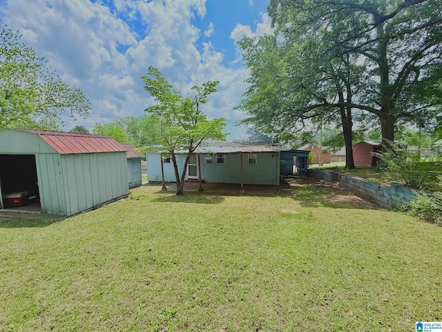 103 Thatcher St, Piedmont, AL 36272 - view of yard with an outdoor structure and a storage unit