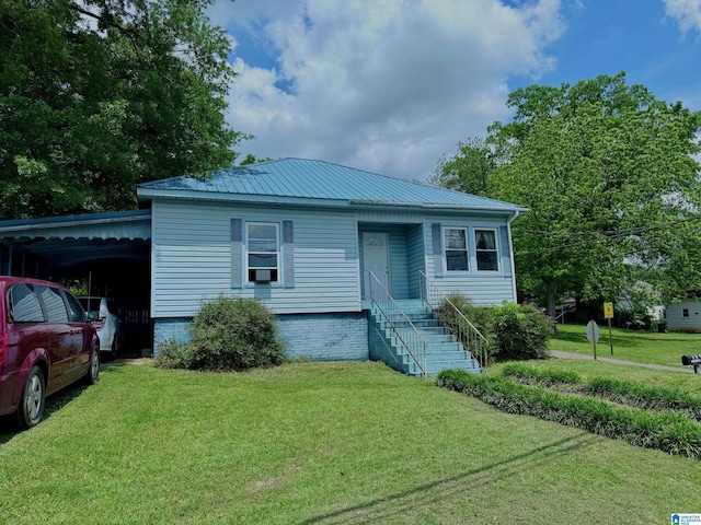 103 Thatcher St, Piedmont, AL 36272 - view of front of house featuring metal roof and a front yard