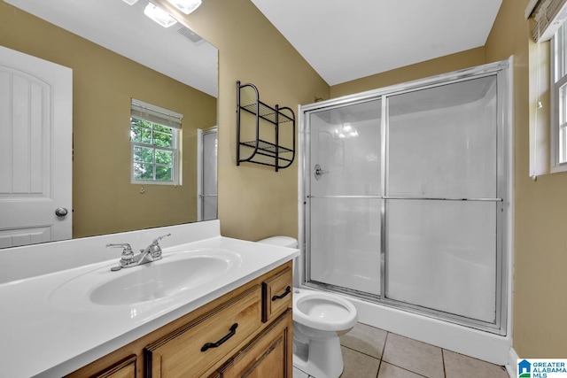 full bathroom with tile patterned flooring, a shower with shower door, toilet, and vanity
