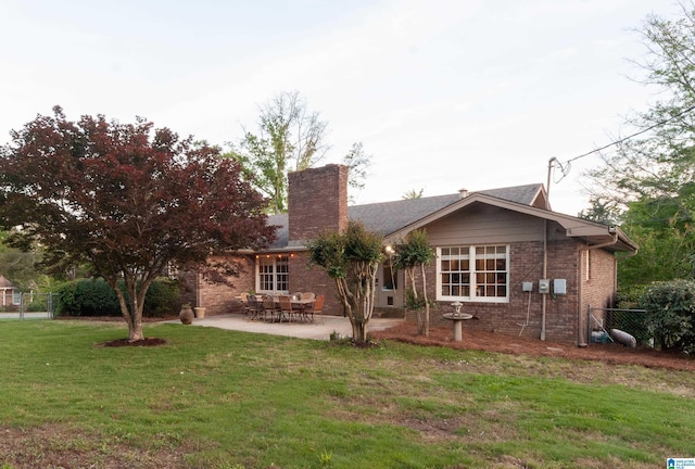 1836 Canton Rd, Vestavia Hills, AL 35216 - rear view of property featuring a chimney, a patio, and brick siding