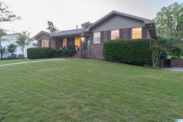 1836 Canton Rd, Vestavia Hills, AL 35216 - ranch-style home with brick siding, a front yard, and covered porch