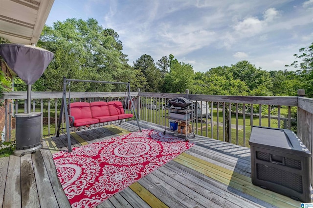 wooden deck with an outdoor living space