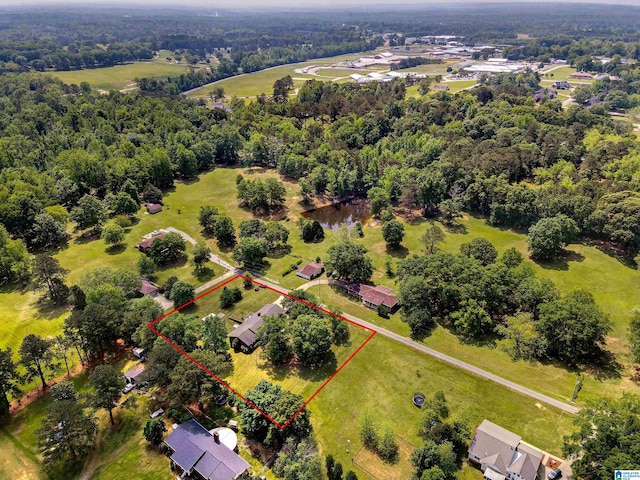 aerial view featuring a forest view