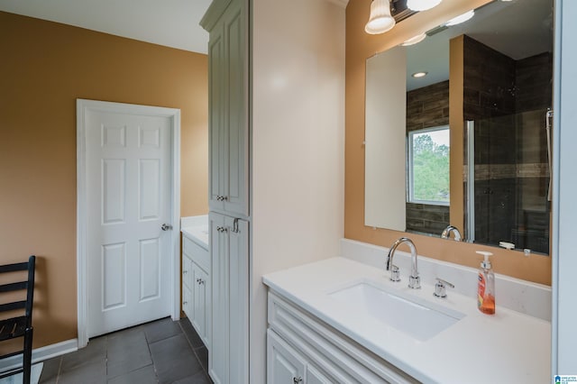 full bathroom featuring vanity and tile patterned floors