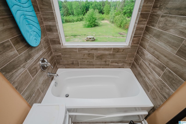 bathroom with a washtub