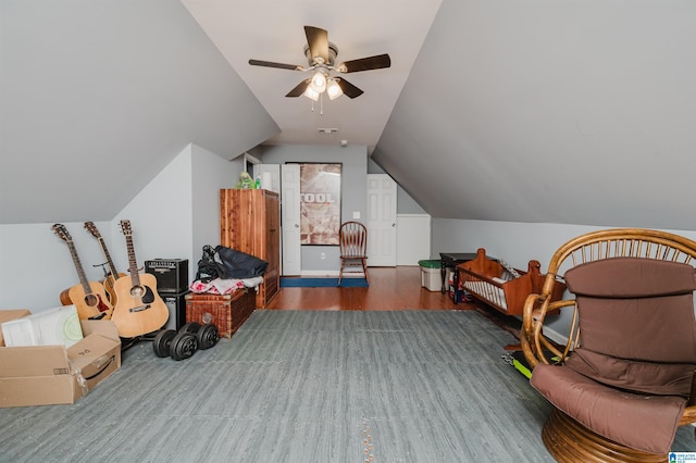 additional living space with ceiling fan, wood finished floors, and lofted ceiling