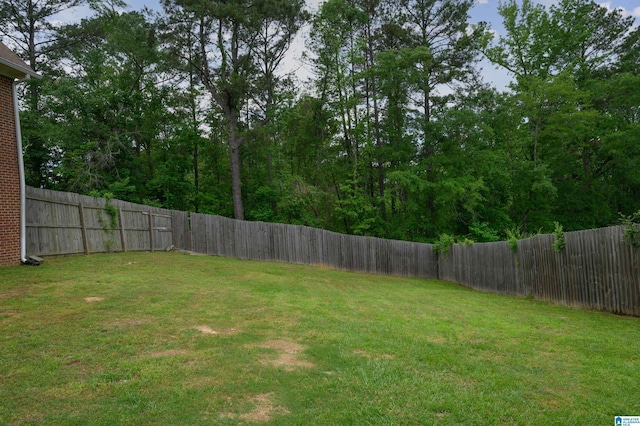 view of yard featuring a fenced backyard
