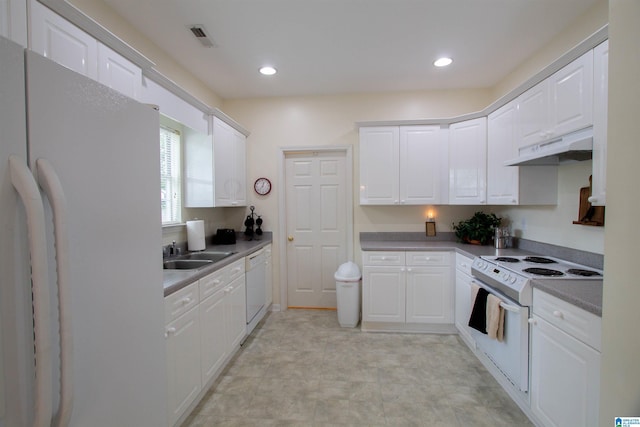 kitchen with a sink, white cabinets, under cabinet range hood, recessed lighting, and white appliances