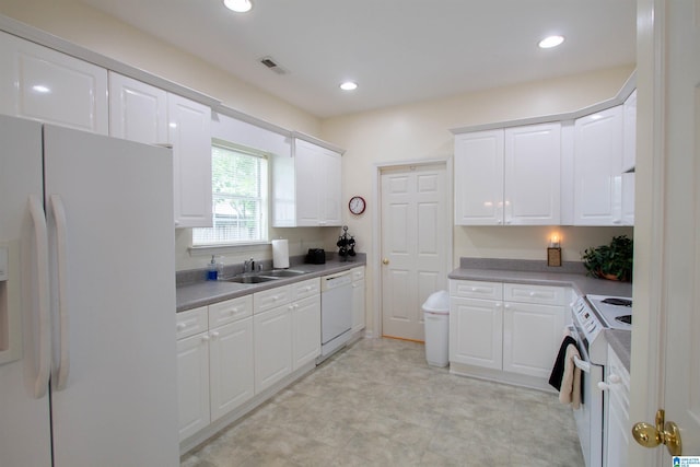 kitchen featuring a sink, white appliances, white cabinetry, recessed lighting, and visible vents