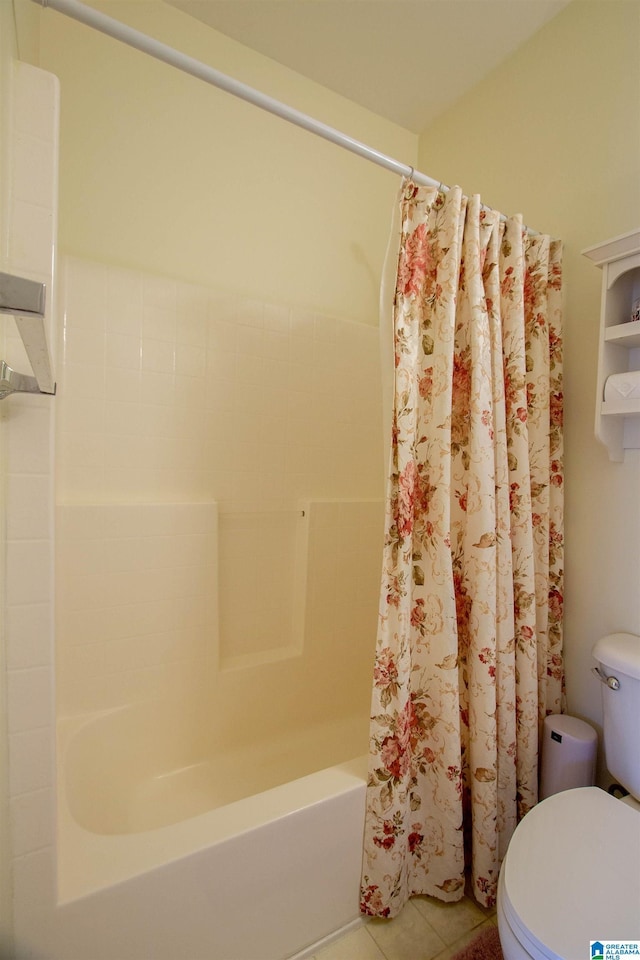 full bath with tile patterned flooring, shower / bath combo, and toilet