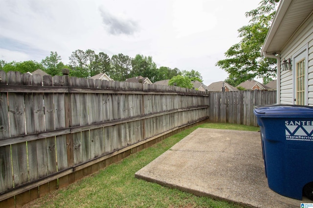 view of yard featuring a fenced backyard and a patio area