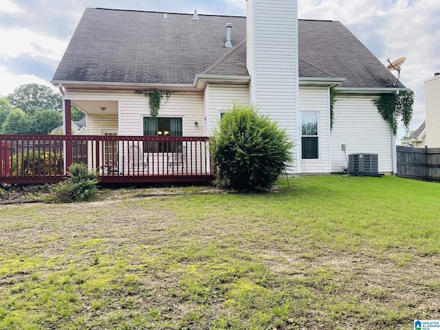 196 King James Ct, Alabaster, AL 35007 - back of house featuring central AC unit, a chimney, a wooden deck, and a shingled roof