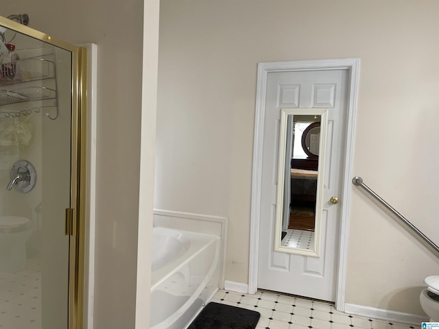 196 King James Ct, Alabaster, AL 35007 - bathroom with tile patterned floors, a stall shower, a bath, and toilet