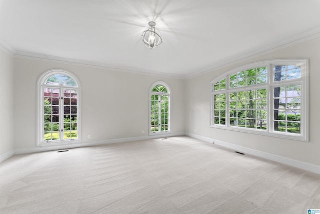 2074 Royal Fern Ln, Hoover, AL 35244 - carpeted spare room featuring baseboards, ornamental molding, and visible vents