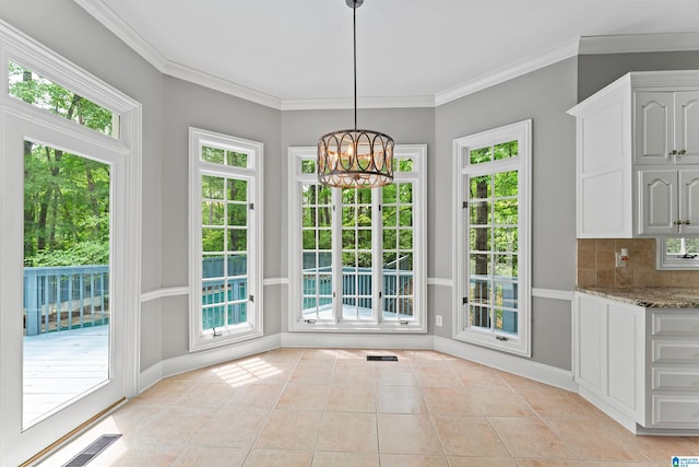 2074 Royal Fern Ln, Hoover, AL 35244 - unfurnished dining area featuring light tile patterned floors, baseboards, plenty of natural light, and a chandelier