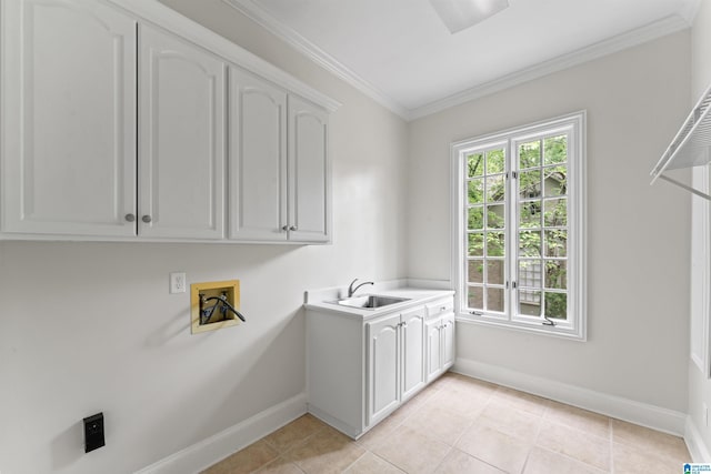 2074 Royal Fern Ln, Hoover, AL 35244 - washroom featuring crown molding, baseboards, hookup for a washing machine, a sink, and cabinet space