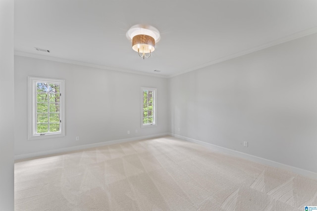 2074 Royal Fern Ln, Hoover, AL 35244 - empty room featuring crown molding, baseboards, visible vents, and light carpet