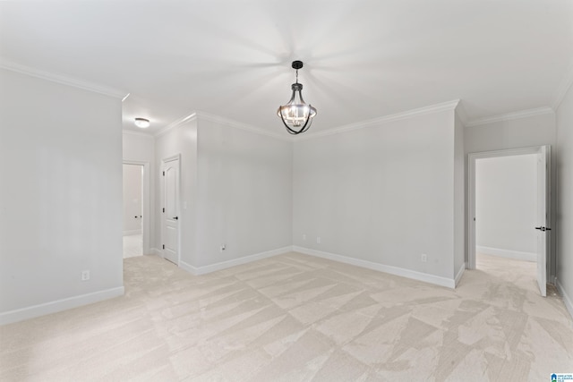 2074 Royal Fern Ln, Hoover, AL 35244 - empty room featuring crown molding, a notable chandelier, baseboards, and light colored carpet