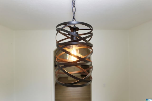 interior details featuring a notable chandelier