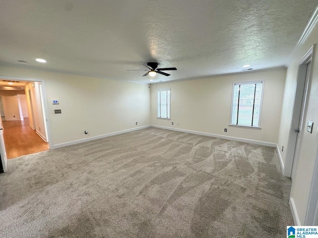 unfurnished room featuring recessed lighting, baseboards, light carpet, and ceiling fan