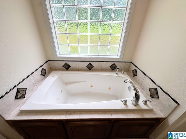 bathroom with a whirlpool tub
