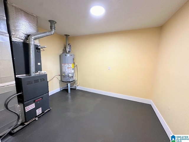 utility room featuring heating unit and gas water heater