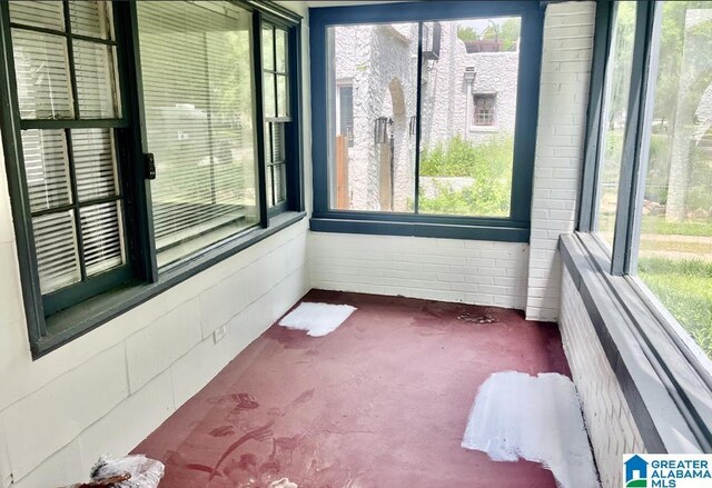 view of unfurnished sunroom