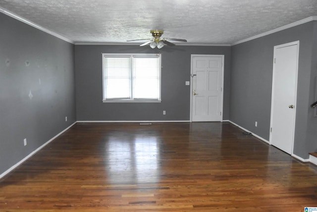 spare room featuring baseboards, ceiling fan, a textured ceiling, and wood finished floors