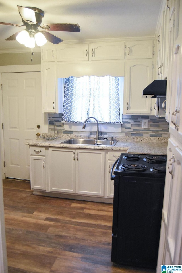 kitchen with ceiling fan, black range with electric stovetop, a sink, white cabinets, and under cabinet range hood