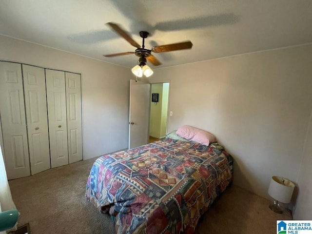 carpeted bedroom with a ceiling fan and a closet