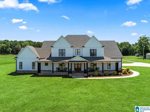 1520 Day Gap Rd, Cullman, AL 35057 - modern farmhouse style home featuring board and batten siding, roof with shingles, covered porch, and a front yard