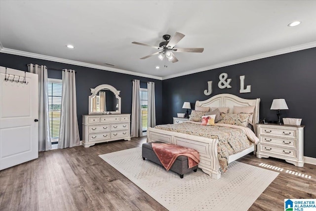 1520 Day Gap Rd, Cullman, AL 35057 - bedroom featuring visible vents, baseboards, wood finished floors, and multiple windows