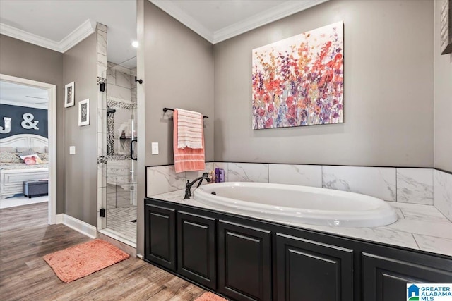 1520 Day Gap Rd, Cullman, AL 35057 - full bath with wood finished floors, a bath, and a stall shower